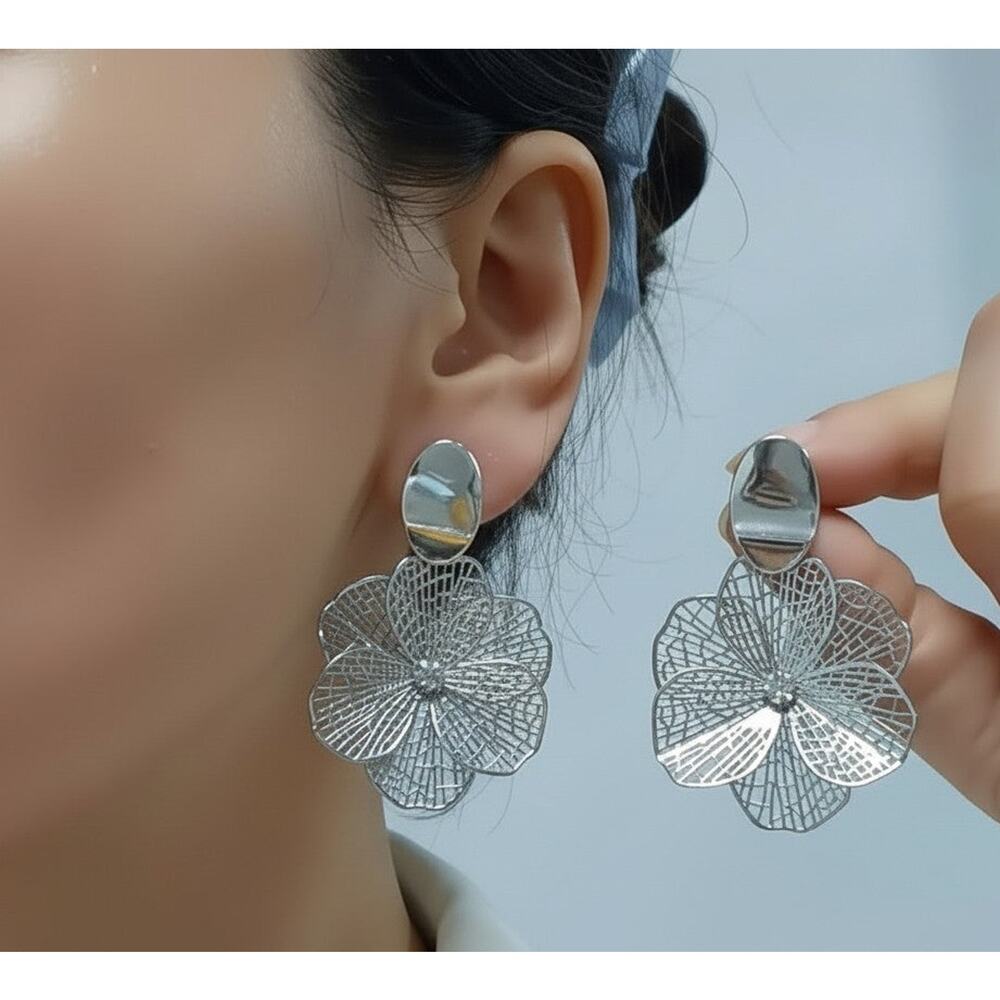Trendy 2" clip on silver cutout dangle flower earrings with clear stone